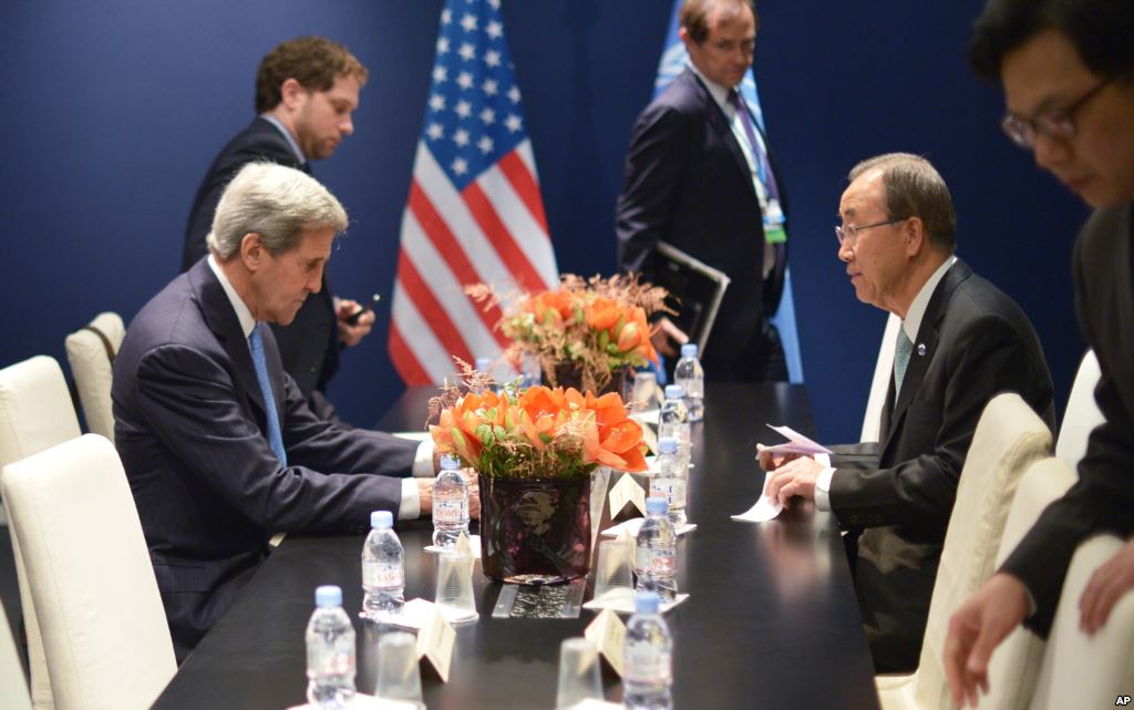 U.S. Secretary of State John Kerry left and United Nations Secretary General Ban Ki-moon meet on the sidelines of the COP 21 United Nations conference on climate change in Le Bourget on the outskirts of Paris Dec. 11 2015