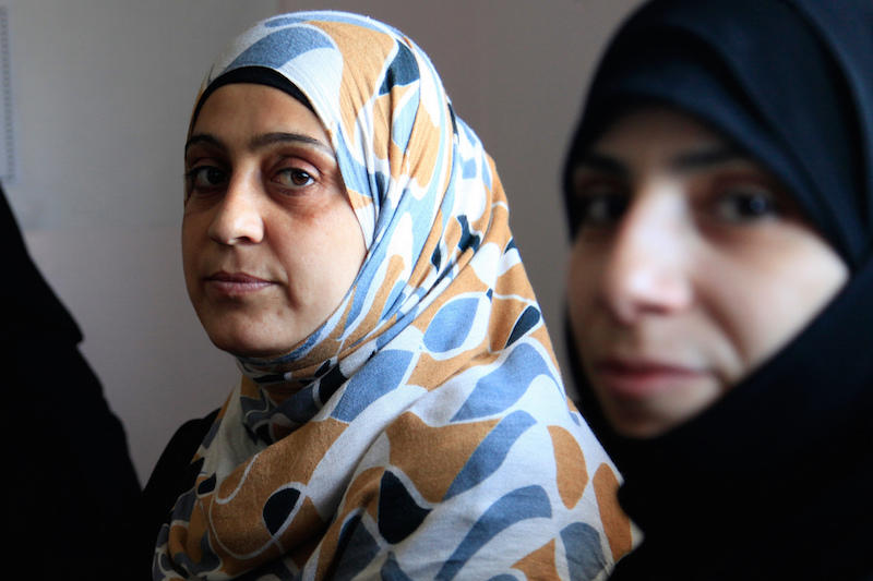Texas groups that resettle Syrian refugees like these women could be sued by the state