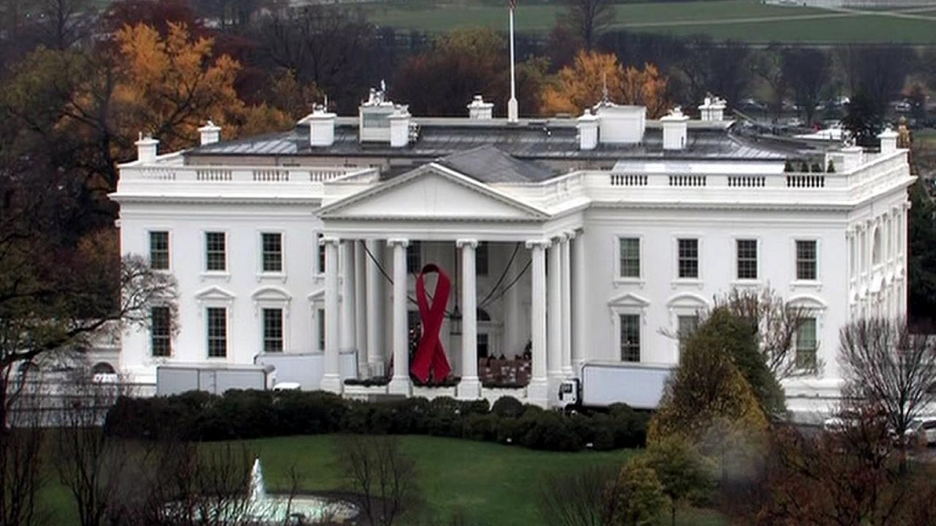 The White House is displaying a large red ribbon on Tuesday