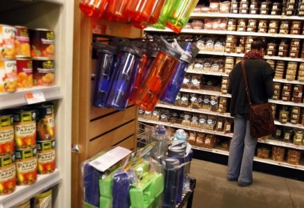 A woman shops for groceries at a Whole Foods supermarket in New York