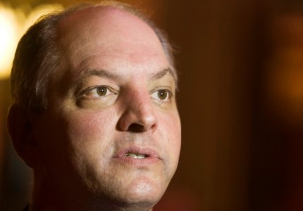 Louisiana Gubernatorial candidate John Bel Edwards speaks to reporters during a Veterans Day event in Baton Rouge Louisiana