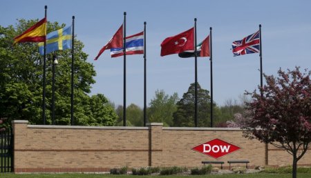 The Dow logo is seen at the entrance to Dow Chemical headquarters in Midland Michigan