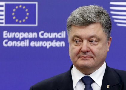 Ukraine's President Petro Poroshenko attends a joint news conference with European Council President Donald Tusk and European Commission President Jean Claude Juncker at the EU Council in Brussels Belgium