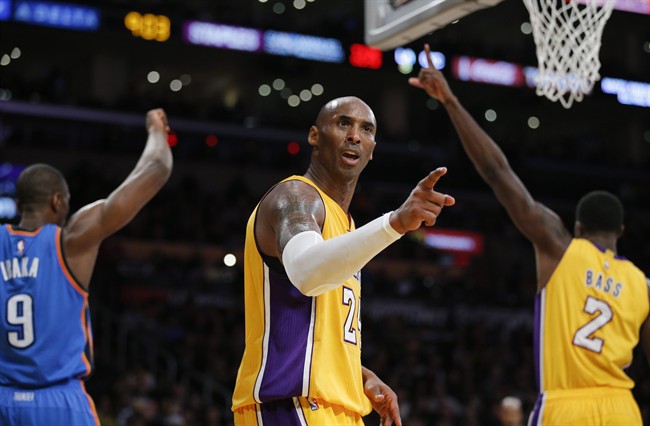 Los Angeles Lakers Kobe Bryant points to a referee after missing a basket during the second half of an NBA basketball game against the Oklahoma City Thunder Wednesday Dec. 23 2015 in Los Angeles