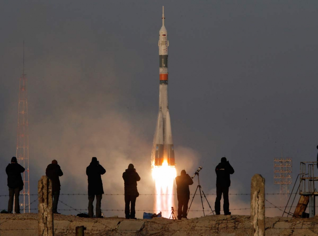 The Soyuz-FG rocket booster with Soyuz TMA-19M space ship carrying a new crew to the International Space Station ISS blasts off at the Russian leased Baikonur cosmodrome Kazakhstan Tuesday Dec. 15 2015