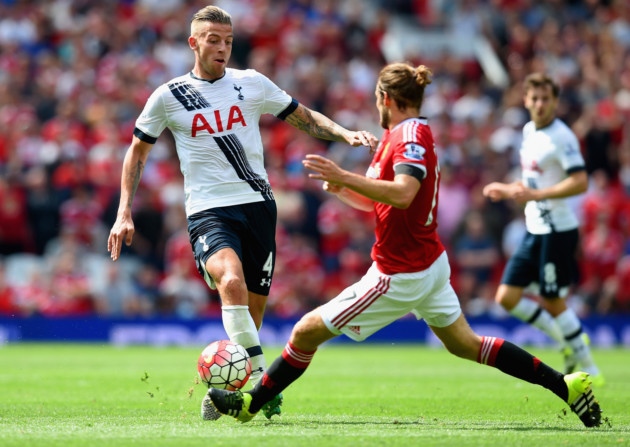 Toby Alderweireld of Tottenham Hotspur and Daley Blind of Manchester United compete for the ball