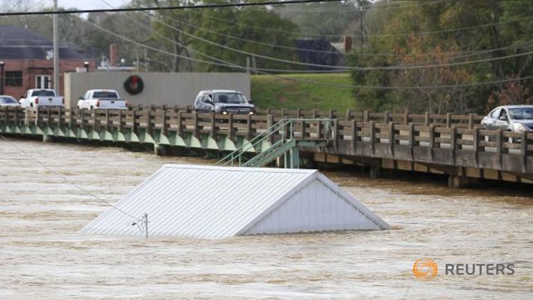 Traffic goes across the bridge on Alabama hwy 87 at the Pea River in Elba Alabama Dec 26 2015.
   
 

  Enlarge  Caption