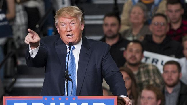 US Republican presidential candidate Donald Trump addresses supporters during a campaign rally at the Greater Columbus Convention Center