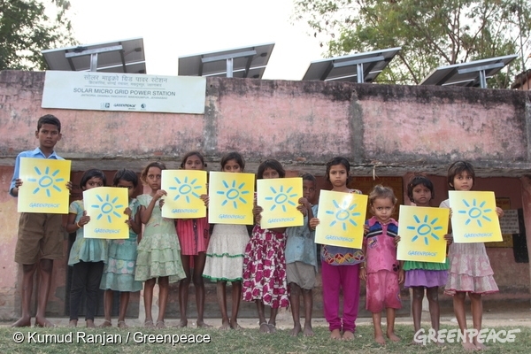 People in Dharnai in Bihar India call for climate action and energy from 100% renewable sources ahead of crunch climate talks in Paris. Dharnai had no electricity until a Greenpeace initiative to supply power through solar panels brought energy to the