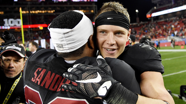 Christian Mc Caffrey and Barry Sanders of the Stanford Cardinal celebrate after they defeated USC in the Pac-12 championship game at Levi's Stadium on Saturday Dec. 5 2015