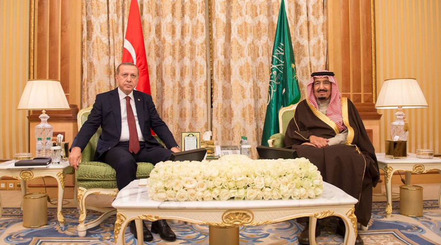 Saudi King Salman stands next to Turkish President Tayyip Erdogan during a welcoming ceremony upon Erdogan's arrival in Riyadh Saudi Arabia