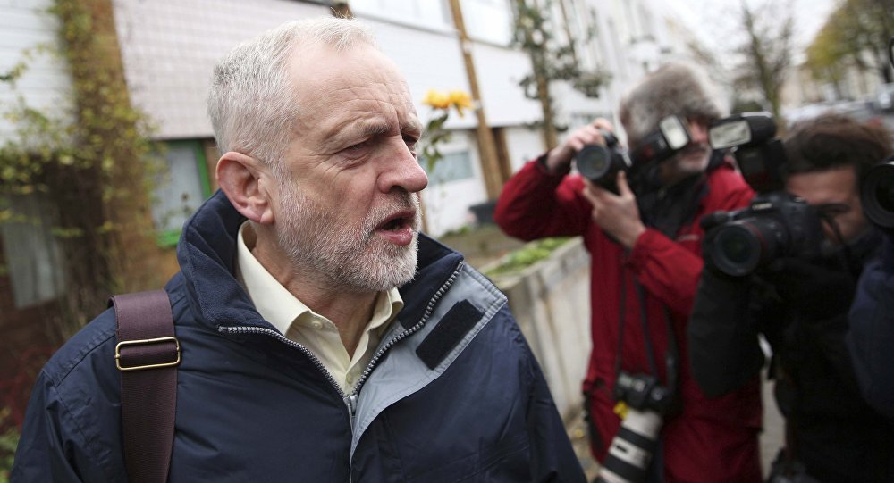 Britain's opposition Labour Party leader Jeremy Corbyn leaves in home in north London Britain