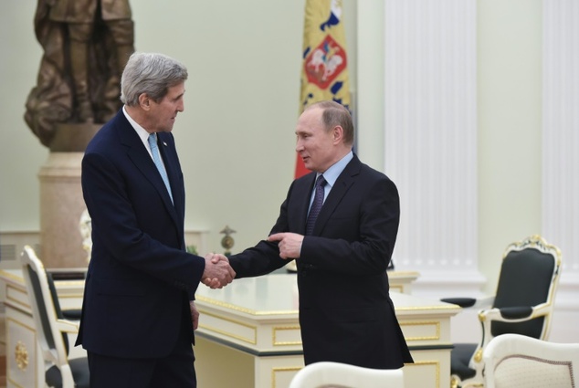 US Secretary of State John Kerry shakes hands with Russia's President Vladimir Putin during a meeting at the Kremlin in Moscow