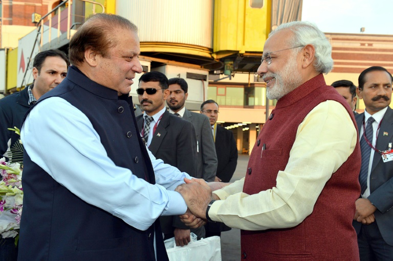 PIB  AFP  Indian Prime Minister Narendra Modi shakes hands with Pakistan Prime Minister Nawaz Sharif upon his arrival in Lahore