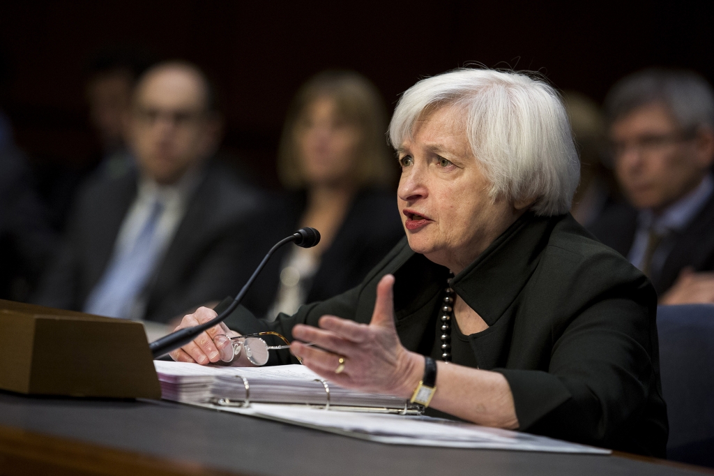 Janet Yellen chair of the U.S. Federal Reserve testifies at a congressional Joint Economic Committee hearing in Washington D.C. U.S. on Thursday Dec. 3 2015. Yellen delivered a cautiously upbeat outlook for the U.S. economy signaling the condition