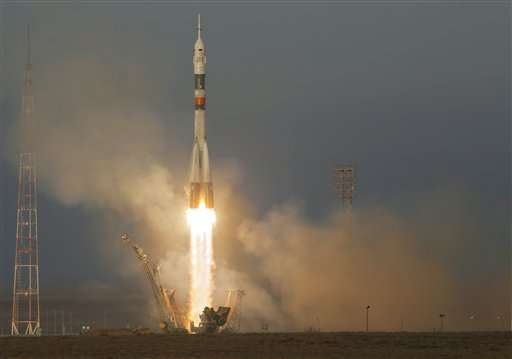 Russian capsule docks safely at International Space Station