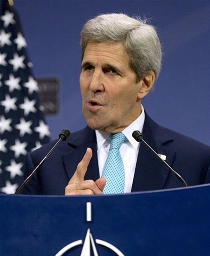 U.S. Secretary of State John Kerry speaks during a media conference at NATO headquarters in Brussels on Wednesday Dec. 2 2015. U.S. Secretary of State John Kerry says NATO members stand ready to step up military efforts against the Islamic State. (AP Ph