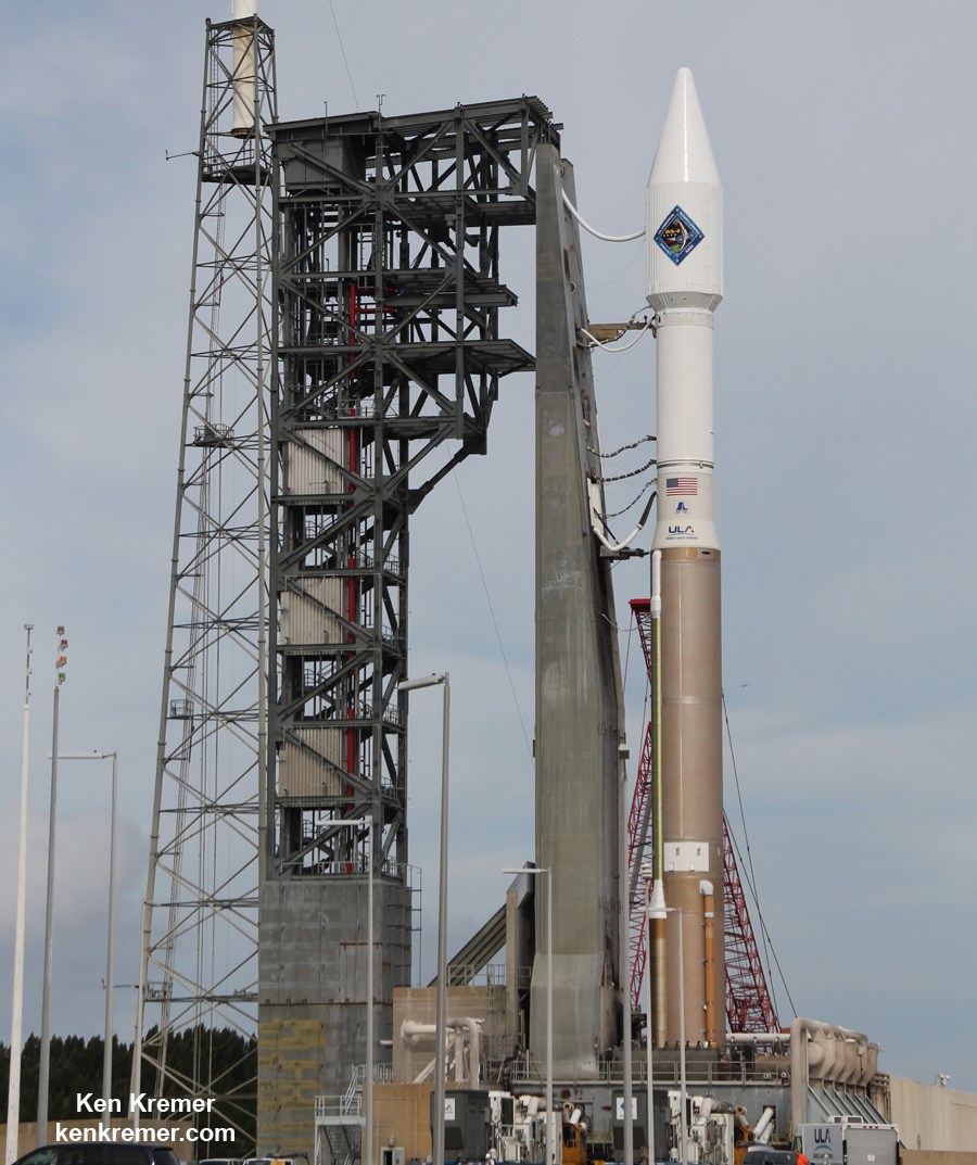 Orbital ATK Cygnus CRS-4 spacecraft poised for blastoff to ISS on ULA Atlas V on Dec. 3 2015 from Cape Canaveral Air Force Station Florida. Atlas is adjacent to new commercial crew access tower. Credit Ken Kremer