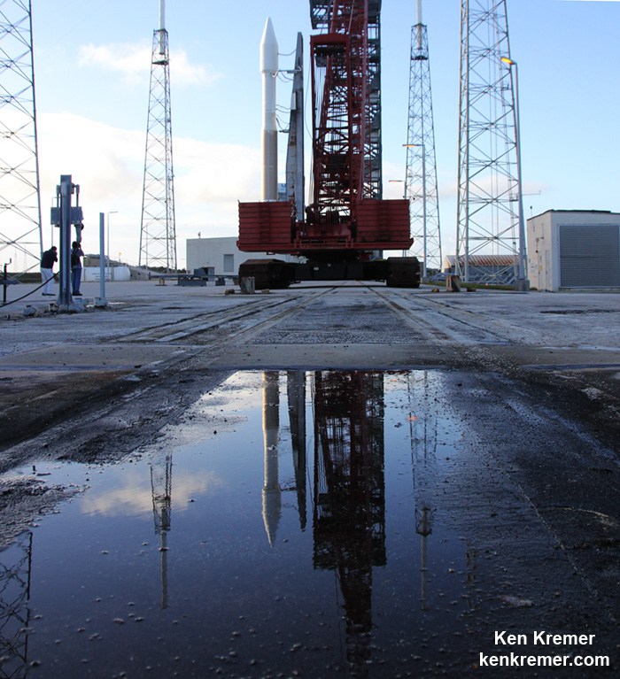 Reflection view of Orbital ATK Cygnus CRS-4 spacecraft poised for blastoff to ISS on ULA Atlas V on Dec. 5 2015 from Cape Canaveral Air Force Station Florida. Credit Ken Kremer