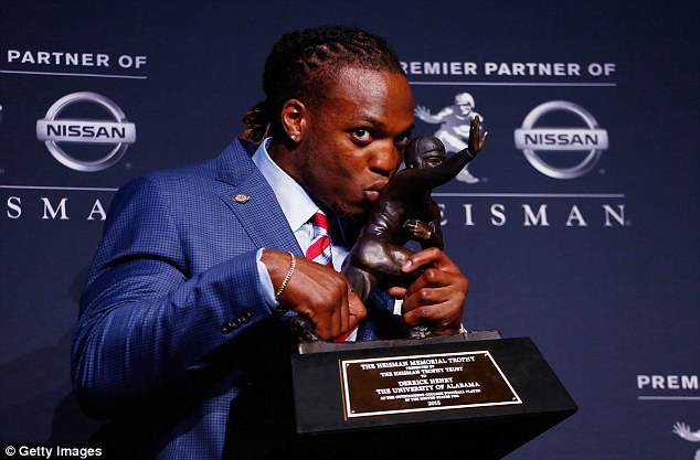 University of Alabama running back Derrick Henry 21 has won this year's Heisman trophy