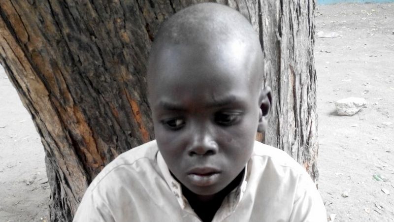 Usman Modu Tella 11-year old boy apprehended by the Nigerian Army