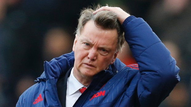 Wearing the pressure on his face Manchester United manager Louis van Gaal looks dejected after the loss to Stoke City at Britannia Stadium