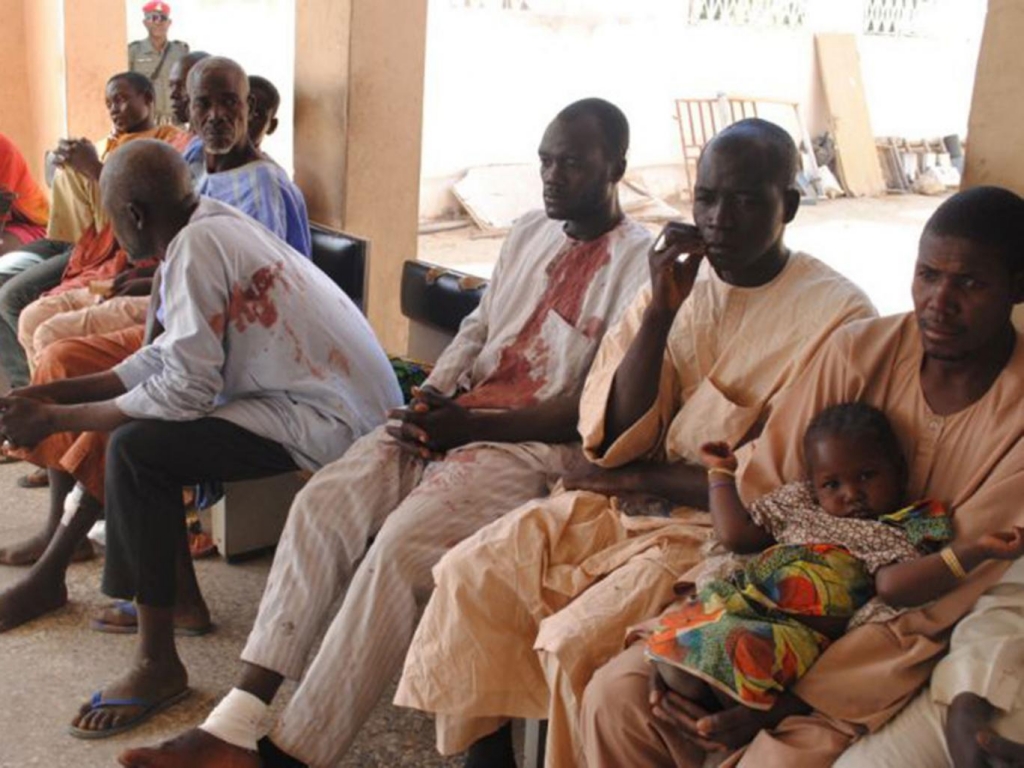 Victims of the Boko Haram attack wait for treatment at a hospital in Maiduguri AP