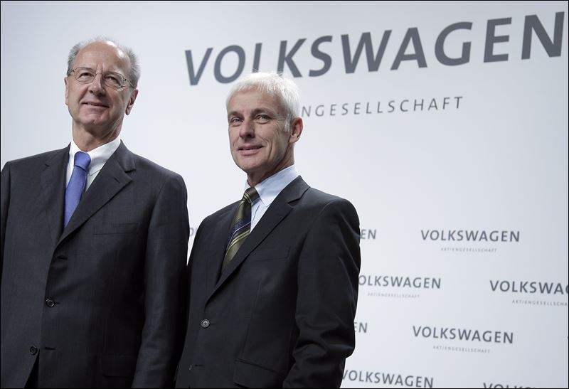 Hans Dieter Poetsch chairman of the board of directors of Volkswagen left and Matthias Mueller CEO of Volkswagen right pose for the media prior to a news conference of the German car manufacturer Volkswagen in Wolfsburg Germany Thursday