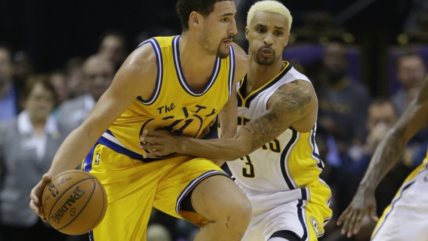 Klay Thompson tries to get by Pacers guard