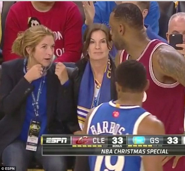 One Golden State Warriors fan sitting courtside during their Christmas day game against the Cleveland Cavaliers was caught red-handed making fun of Le Bron James