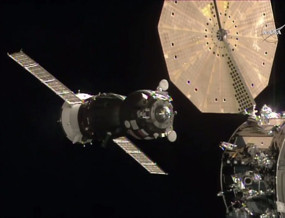 The Russian Soyuz TMA-19M spacecraft carrying NASA astronaut Tim Kopra British astronaut Tim Peake and Russian cosmonaut Yuri Malenchenko is seen on docking approach to the International Space Station on Dec. 15 2015