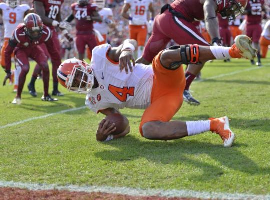 Clemson quarterback Deshaun Watson tumbles into the endzone