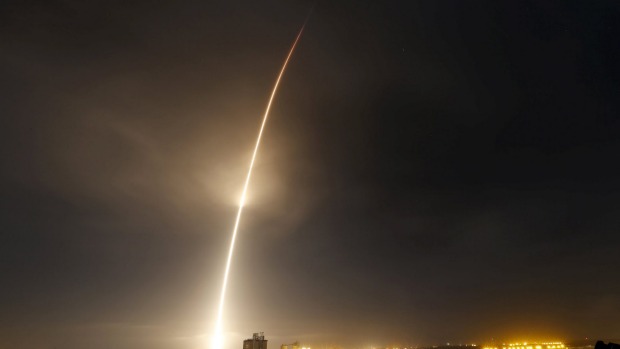 A remodeled version of the SpaceX Falcon 9 rocket lifts off from Cape Canaveral