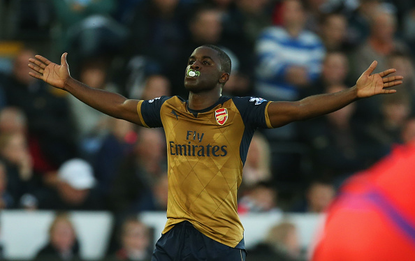 SWANSEA WALES- OCTOBER 31 Joel Campbell of Arsenal celebrates scoring his team's third goal during the Barclays Premier League match between Swansea City and Arsenal at Liberty Stadium