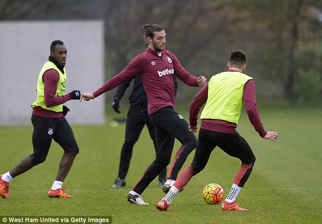 Andy Carroll trains with his West Ham team-mates in the build up to the clash with Swansea City but is set to be ruled out of the match at the Liberty Stadium