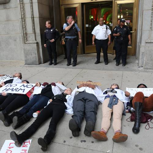 Protesters Call for Mayor Emanuel's Resignation Ahead of Citywide Walkout