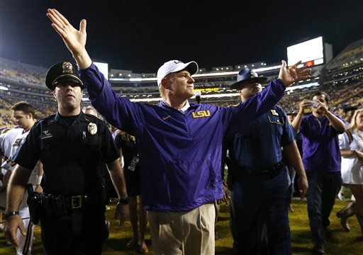 LSU head coach Les Miles celebrates after an NCAA college football game against Texas A&M in Baton Rouge La. Saturday Nov. 28 2015. LSU won 19-7