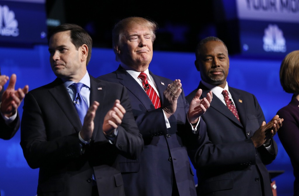 Republican U.S. presidential candidates U.S. Senator Marco Rubio businessman Donald Trump and Dr. Ben Carson applaud before the start of the 2016 U.S. Republican presidential candidates debate held by CNBC in Boulder Colorado