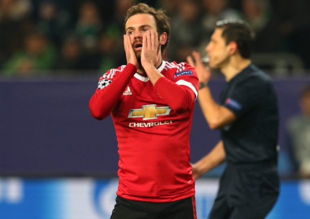 WOLFSBURG GERMANY- DECEMBER 08 Juan Mata of Manchester United reacts after a missed chance on goal during the UEFA Champions League group B match between VfL Wolfsburg and Manchester United at the Volkswagen Arena