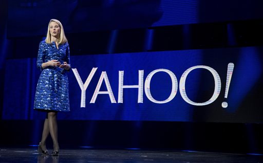 Yahoo president and CEO Marissa Mayer speaks during the International Consumer Electronics Show in Las Vegas. Yahoo announced Wednesday Dec. 9 2015 it is scrapping its original plan to spin off its prized stake