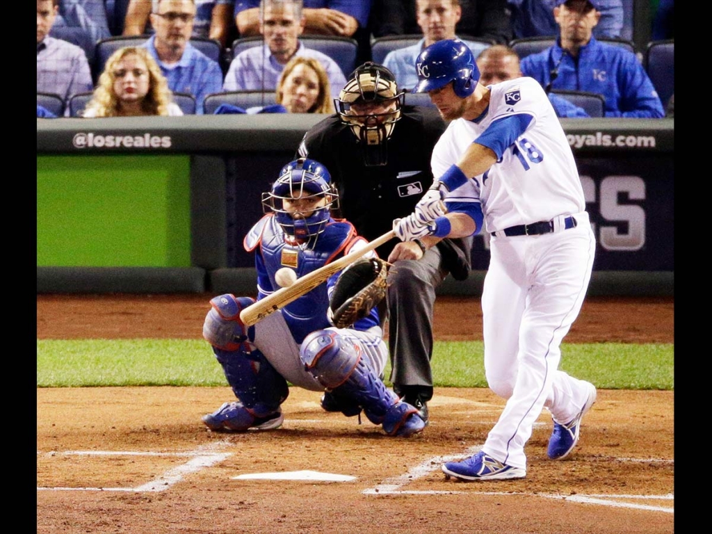 Kansas City Royals&#039 Ben Zobrist hits a home run against the Toronto Blue Jays during the first inning in Game 6 of baseball's American League Championship Series in Kansas City Mo