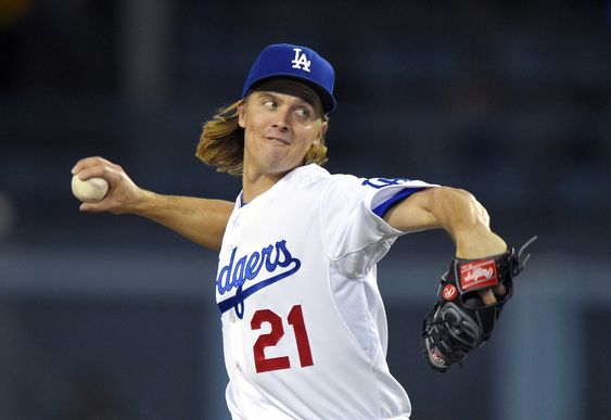 Los Angeles Dodgers starting pitcher Zack Greinke throws to the plate during the first inning of a baseball game against the Pittsburgh Pirates in Los Angeles. A person with knowledge of the deal tells The