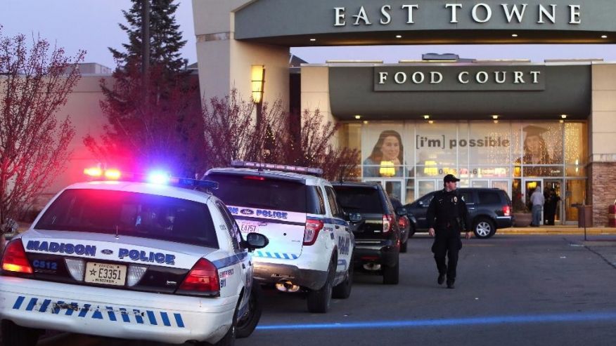 Authorities respond to reports of shots fired at East Towne Mall in Madison Wis. Saturday Dec. 19 2015. Madison police said one person was shot in the leg during a'disturbance inside the mall but his injuries are not life threatening. (Amber Arnold