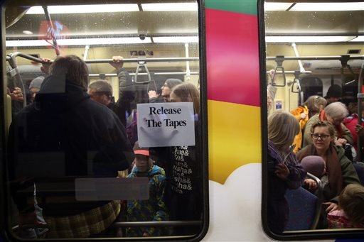 Protesters get on light rail at the Mall of America transit hub. A large protest that started at the Mall of America quickly migrated Wednesday Dec. 23 2015 to Minneapolis-St. Paul International Airport where demonstrators blocked roads and caused sig