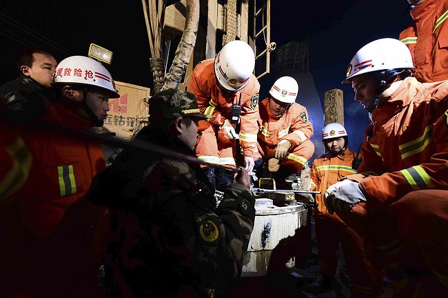 Rescue teams drill 'life holes' to get food, water to 17 trapped miners