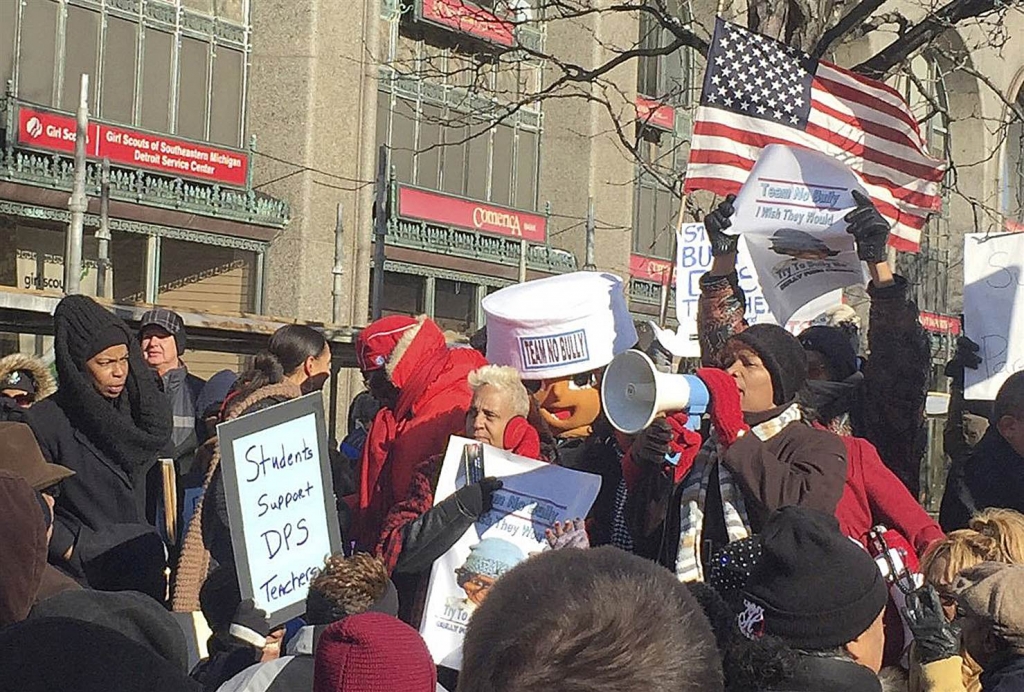 A group of over a hundred teachers joined by parents and children protest Monday Jan. 11 2016 in Detroit. Kim Kozlowski  Detroit News via AP