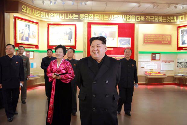 AFP  GETTY    
     CHEERS The crowd gathered to watch the announcement