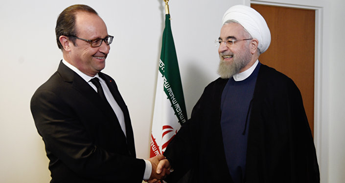 French President Francois Hollande welcomes his Iranian counterpart Hassan Rouhani for a meeting during the 70th UN General Assembly