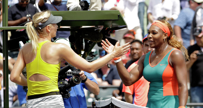 Maria Sharapova of Russia left congratulates Serena Williams at the Sony Open tennis tournament in Key Biscayne