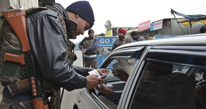 Indian security personnel check people entering an airbase in Pathankot India Monday Jan. 4 2016